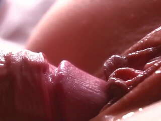 Lento motion&period; extremamente close-up&period; esperma gotejamento para baixo o cona