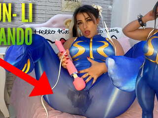 Sedusive cosplay girl dressed as Chun Li from street fighter playing with her htachi vibrator cumming and soaking her panties and pants ahegao