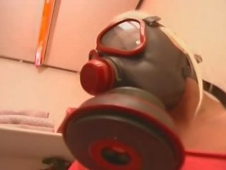 Gas Mask Wearing Euro German whore Masturbates In The Toilet