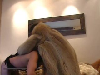 Asian femdom in fur coat